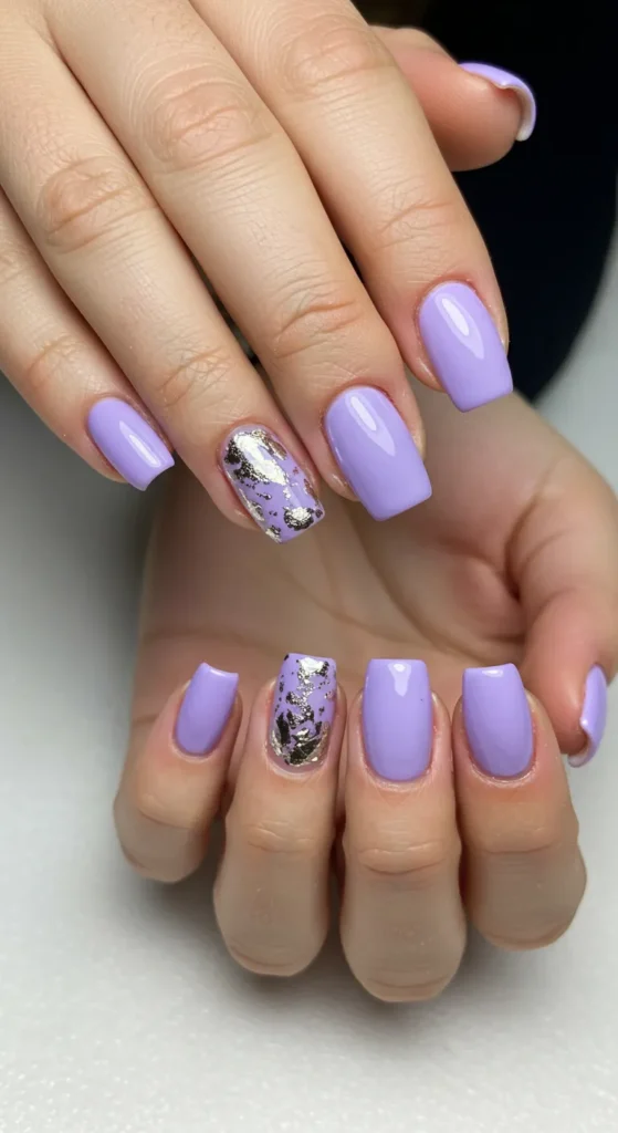 A dreamy set of Lavender nails featuring soft pastel purple shades, perfect for a serene and elegant spring manicure.