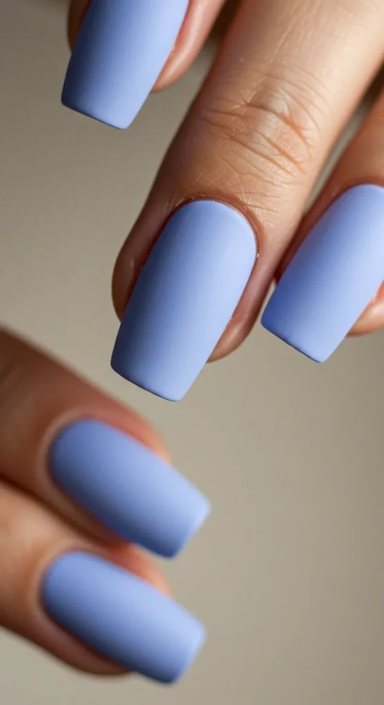 Matte baby blue or lavender nails with a soft, velvety finish, exuding modern elegance and charm.

