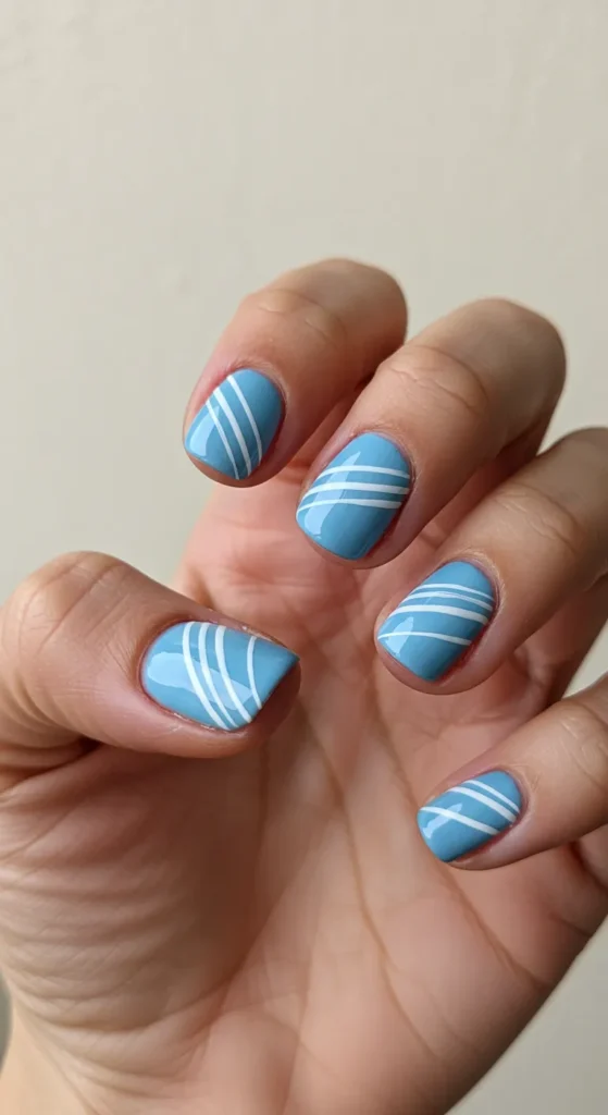 Soft Blue with White Stripes nails designs ideas